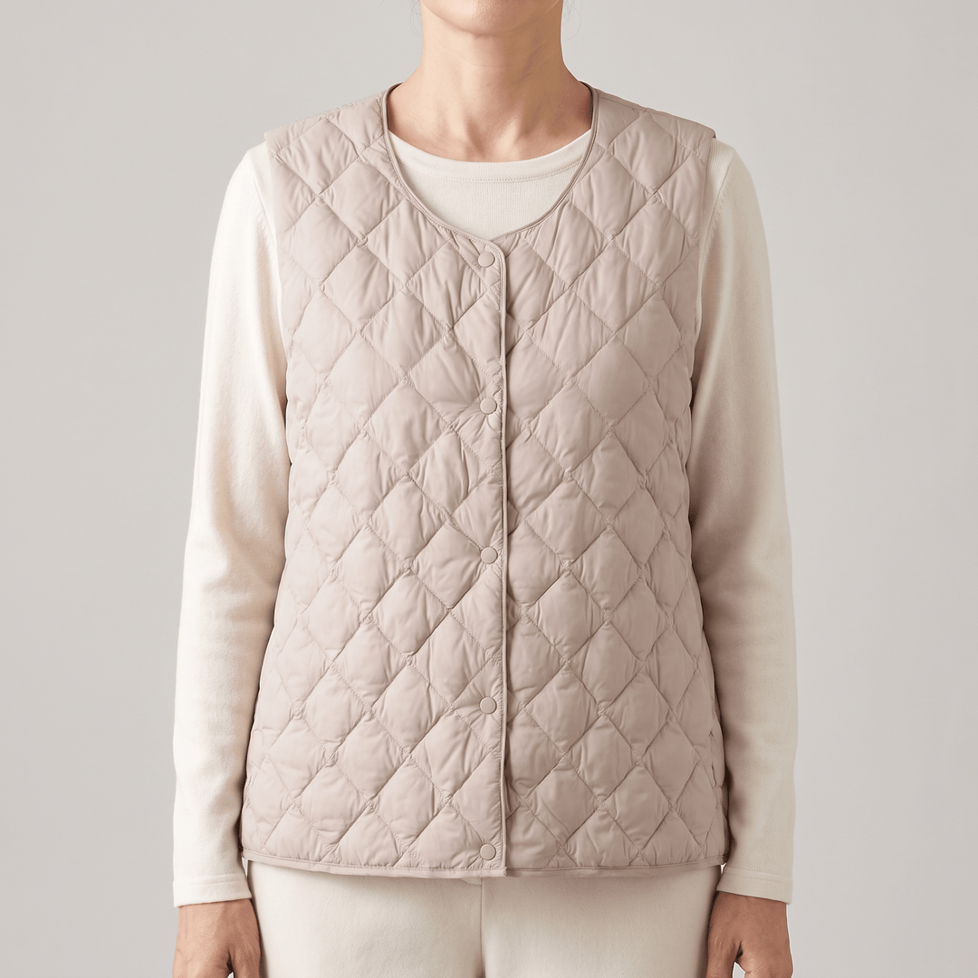 Beige quilted sleeveless vest with diamond stitching and button-front closure