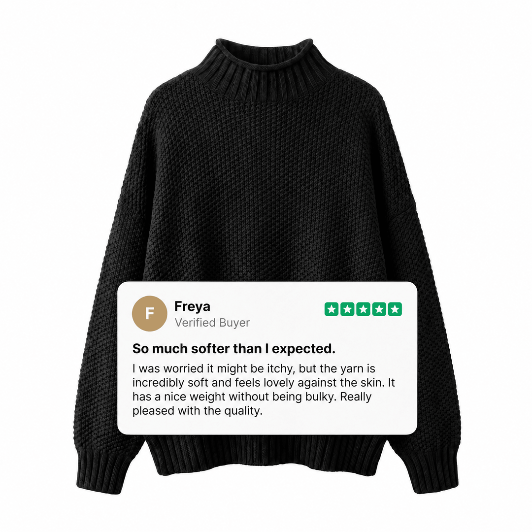 Black cashmere turtleneck sweater, textured knit with ribbed collar and cuffs.