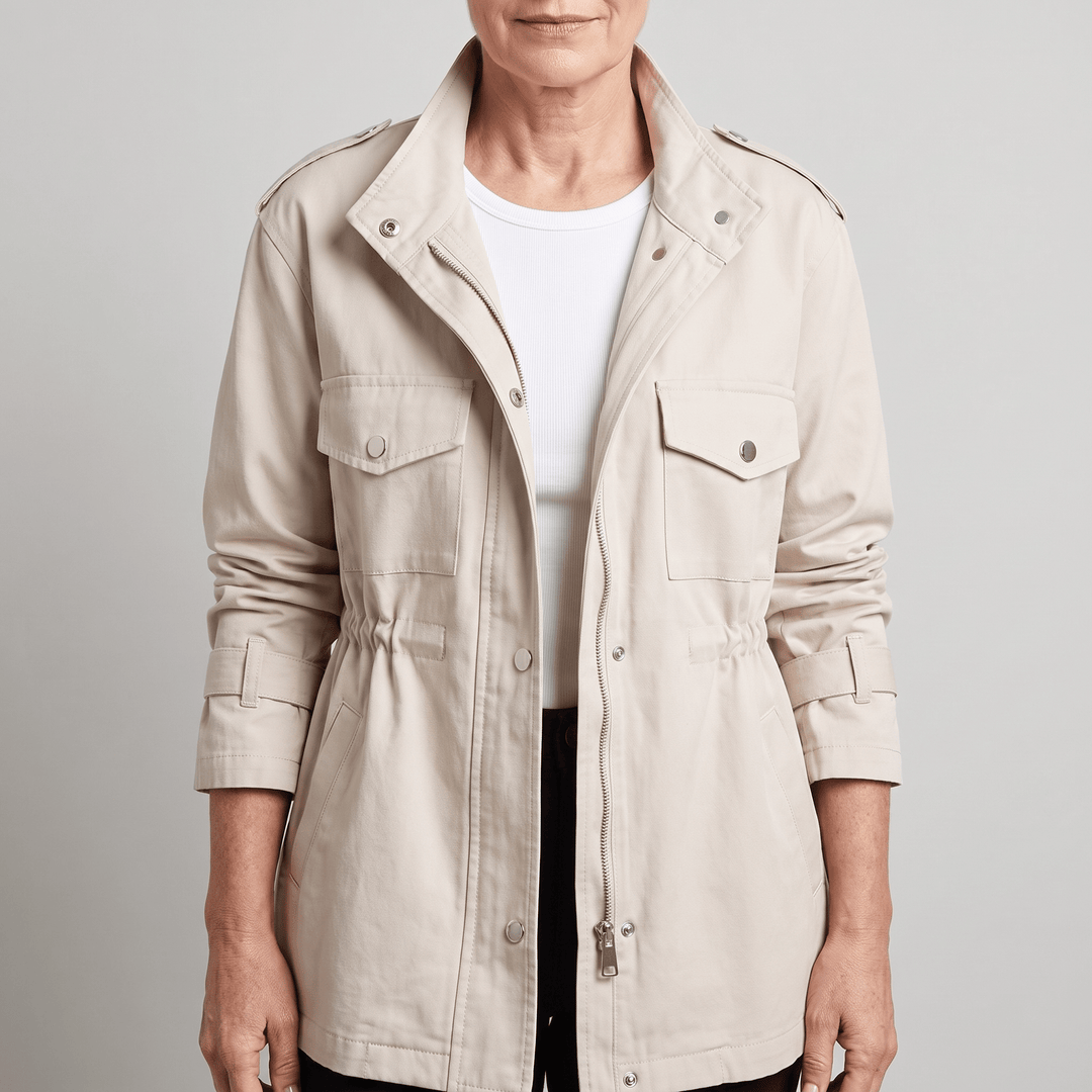 Cream overcoat with stand collar, button front, and dual chest pockets