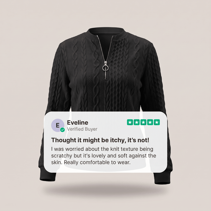 Black cable-knit zip-up sweater with stand collar and metal zipper pull