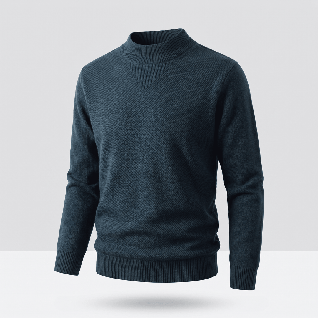 Deep teal jacquard knit sweater with ribbed mock neck and long sleeves