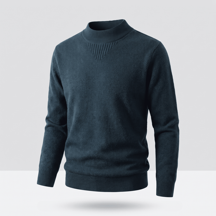 Deep teal jacquard knit sweater with ribbed mock neck and long sleeves