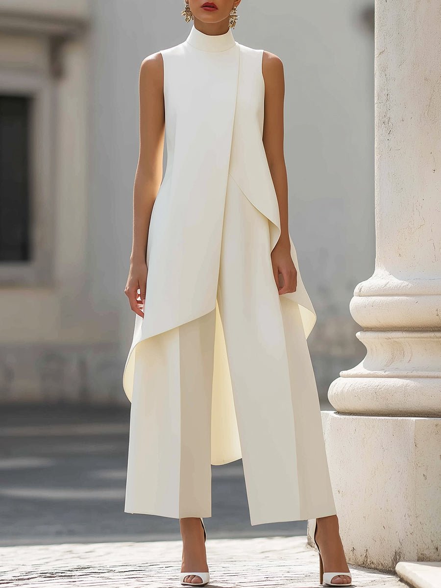 White sleeveless high-neck maxi dress with layered asymmetrical skirt