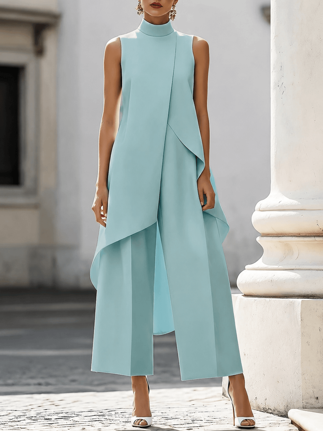 Light blue sleeveless high-neck maxi dress with draped wrap panels