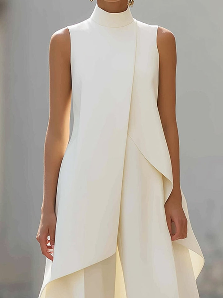 White high-neck sleeveless maxi dress with draped asymmetrical overlay