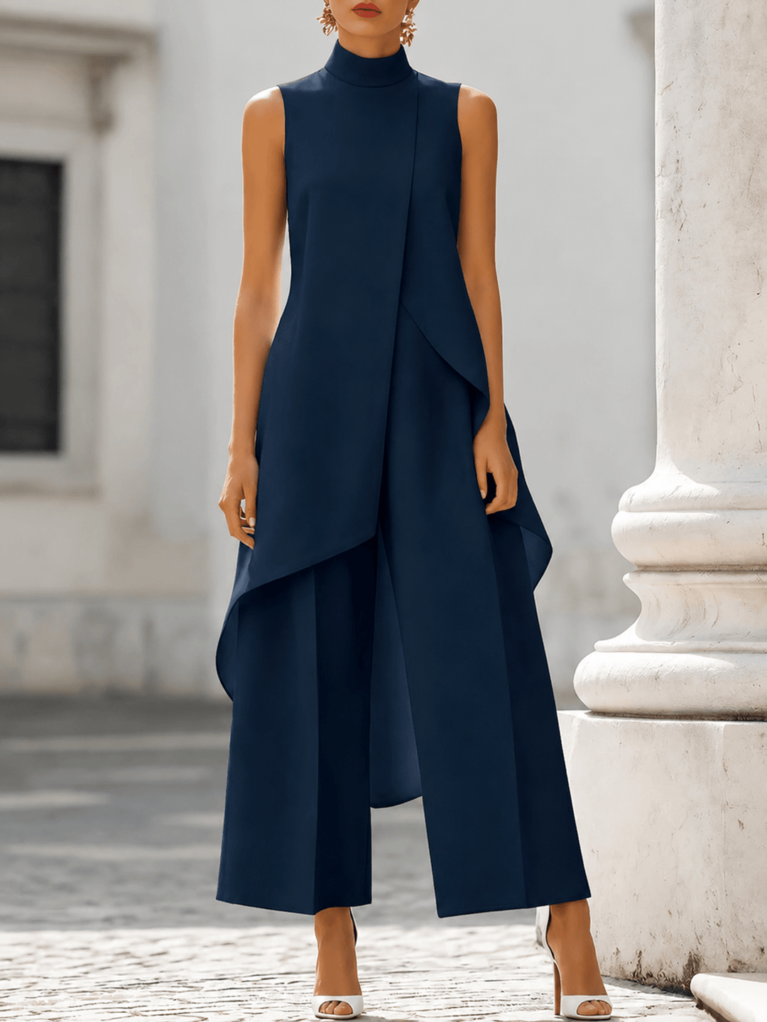 Navy sleeveless high-neck maxi dress with flowing asymmetrical drape panels