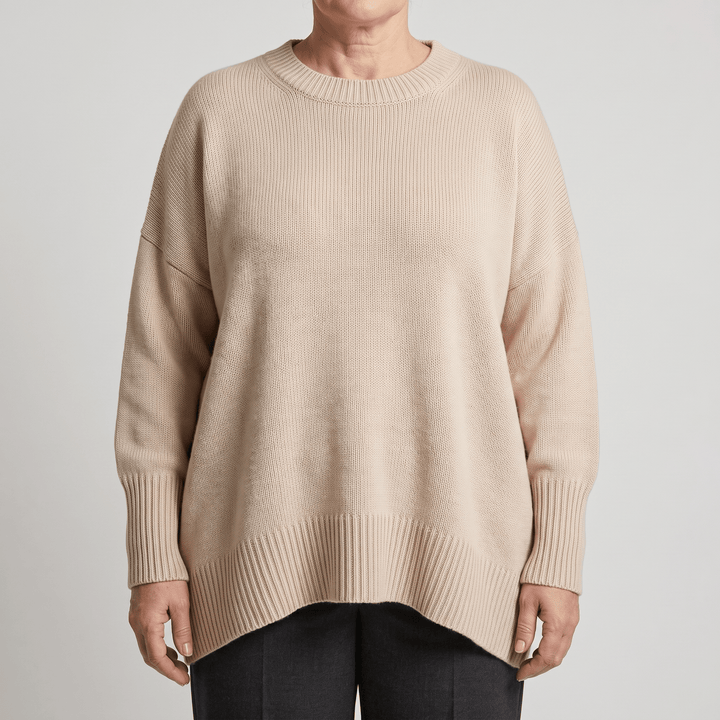 Beige ribbed crewneck pullover sweater with dropped shoulders and long cuffs