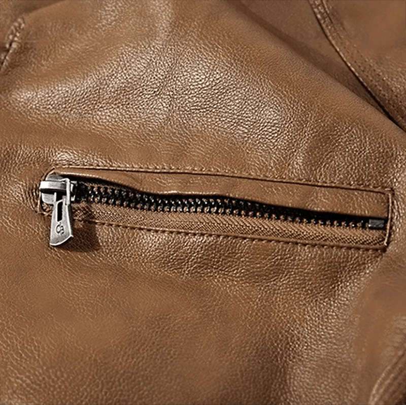 Cigar brown leather zipper pull on leather jacket with metal slider