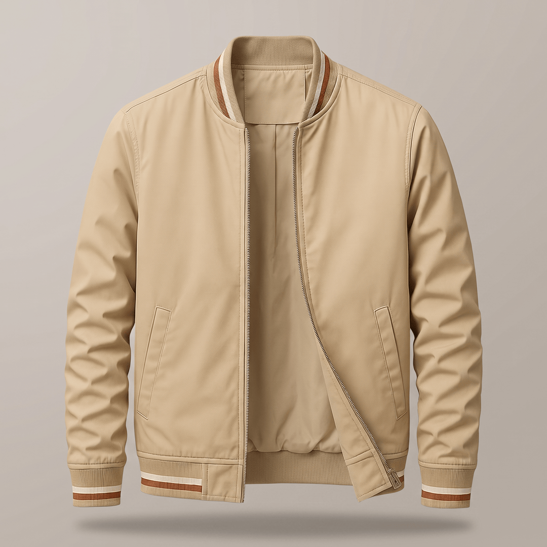 Beige zip bomber jacket with diagonal pocket seams and ribbed cuffs with striped hem.
