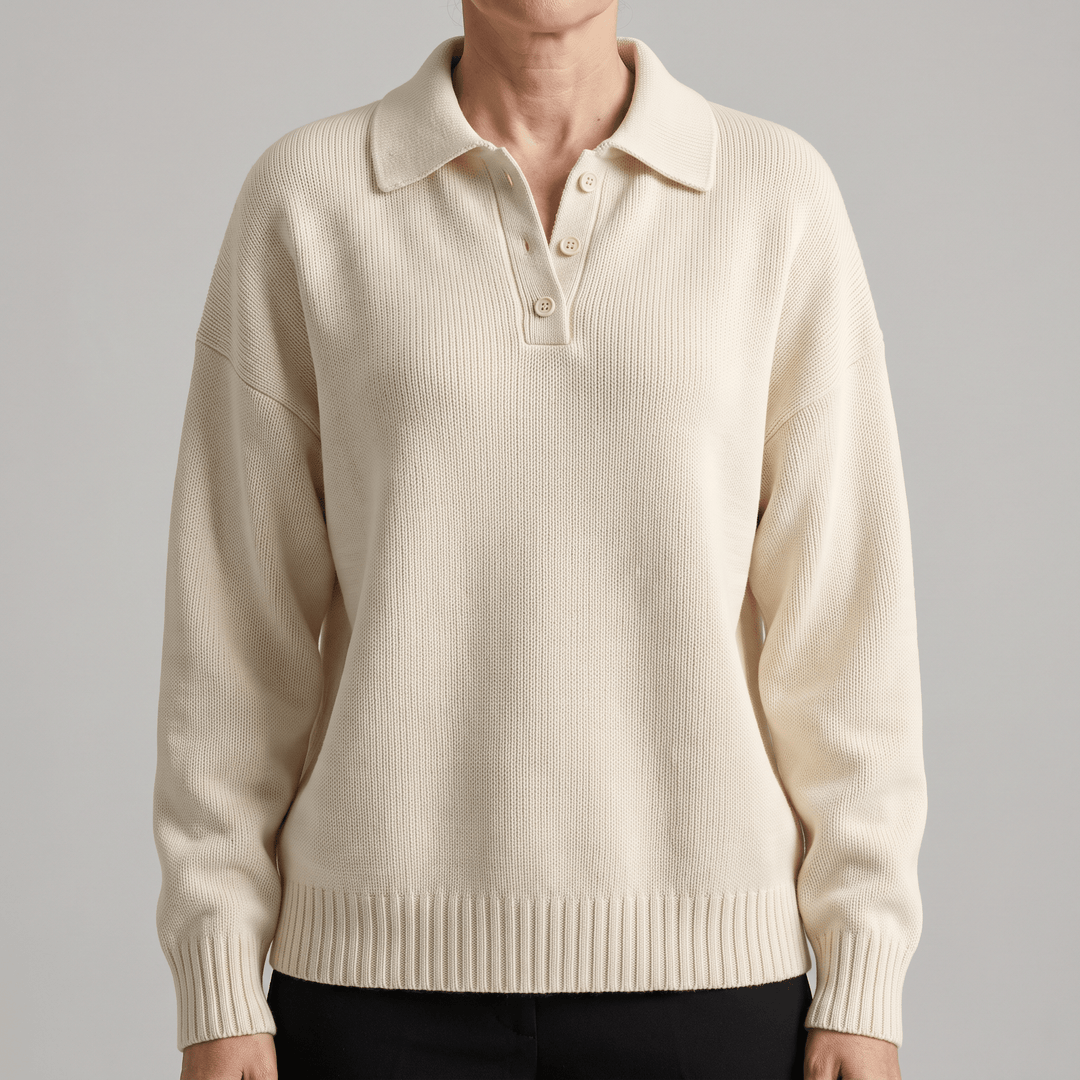 Cream soft knit polo sweater with ribbed cuffs, hem, and button placket