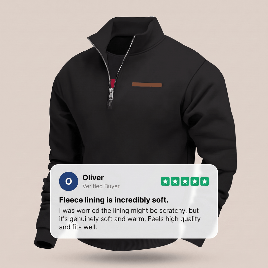 Black fleece sweatshirt with half-zip and stand collar, small chest label patch