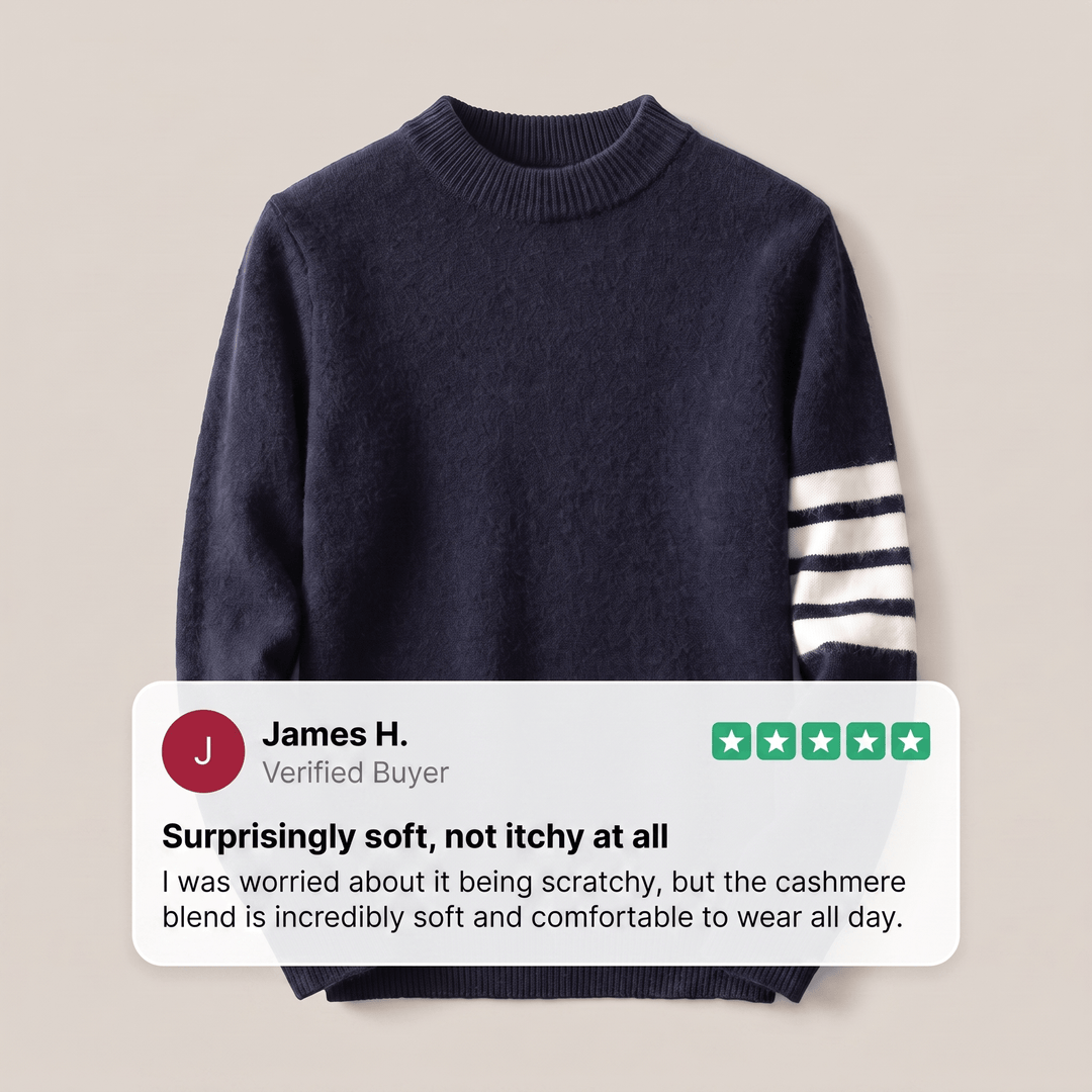 Navy cashmere crewneck sweater with ribbed cuffs, hem, and striped sleeve panel