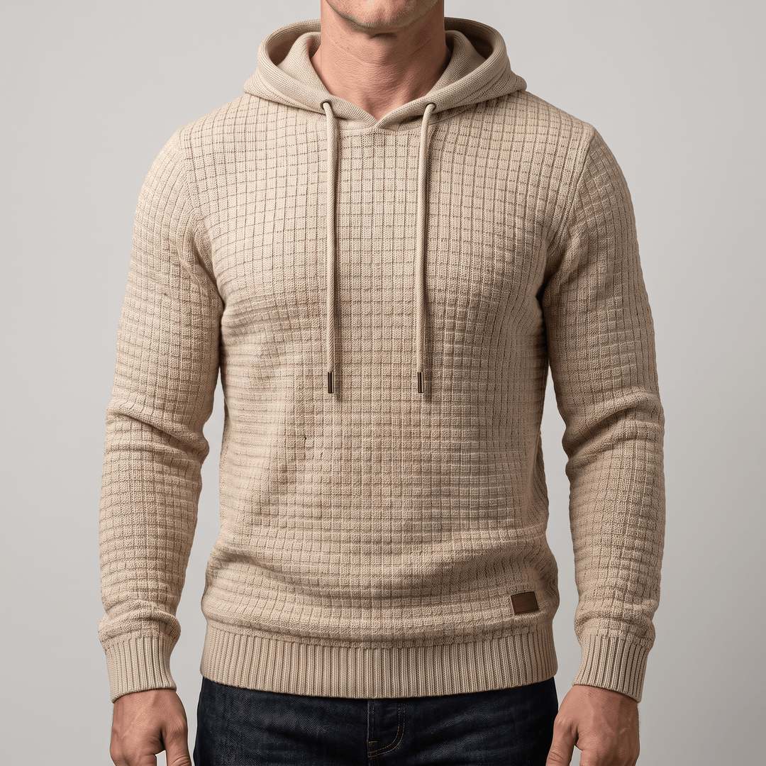 Beige waffle-knit hoodie with adjustable drawstring hood, kangaroo pocket, ribbed hem and cuffs