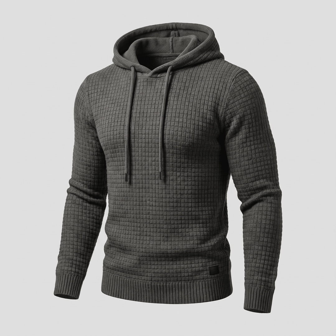 Dark grey waffle-knit hoodie with adjustable drawstring hood, kangaroo pocket, ribbed cuffs and hem
