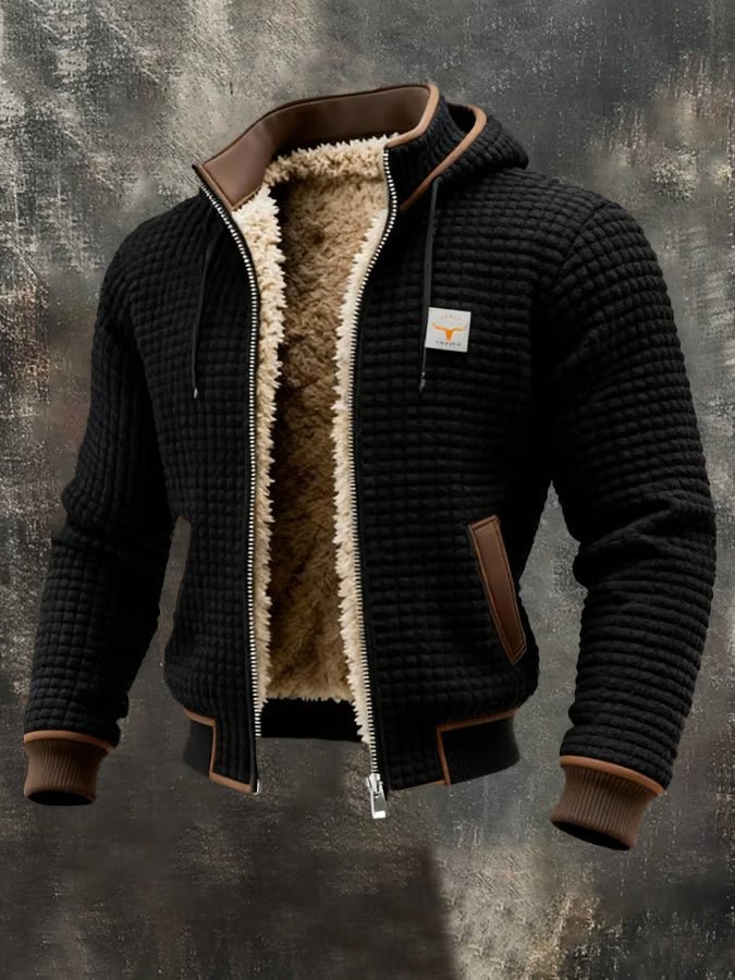 Black quilted hooded jacket with sherpa-lined hood and brown leather-look pocket panel