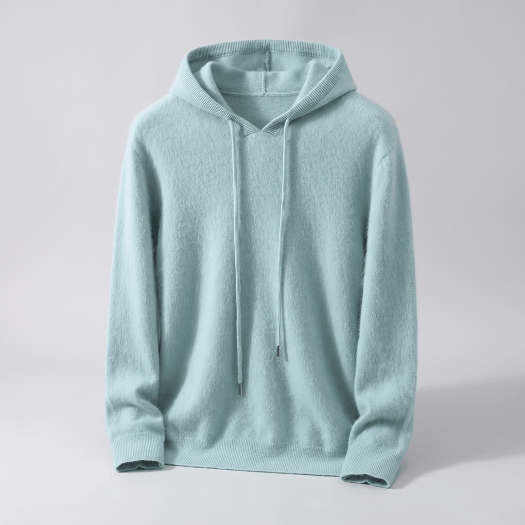 Teal cashmere pullover hoodie with adjustable hood drawstring, ribbed cuffs and hem.