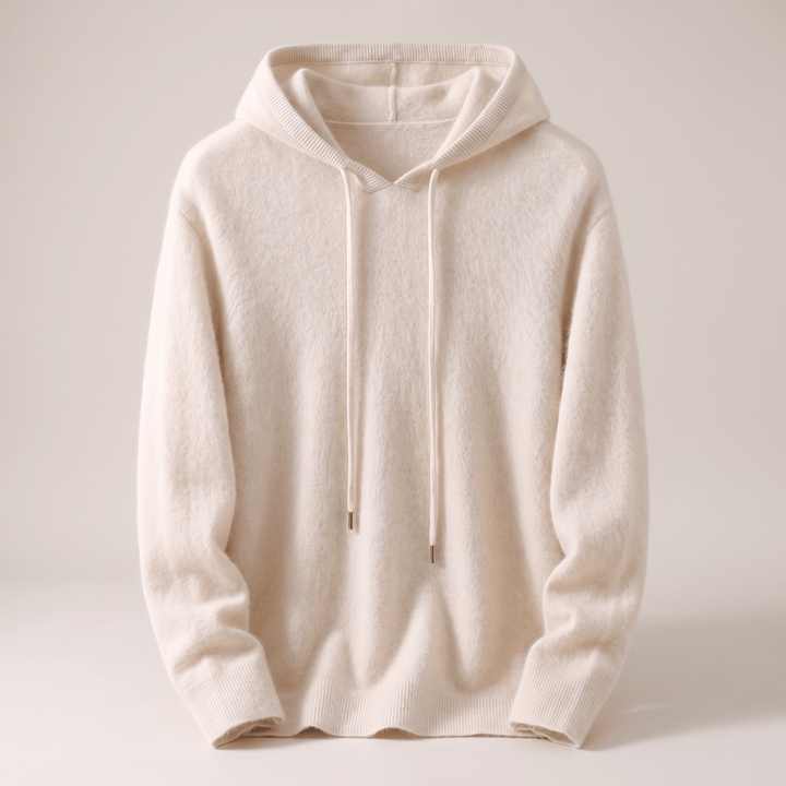 Cream cashmere hoodie with pullover hood, drawstring ties, and ribbed hem and cuffs.