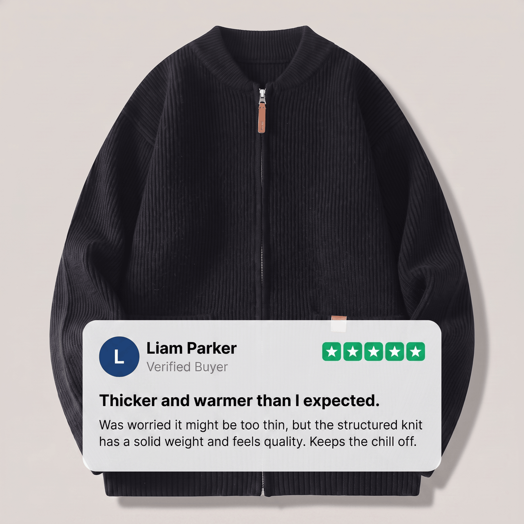 Black rib knit jacket with full zip front and patch pockets, ribbed collar