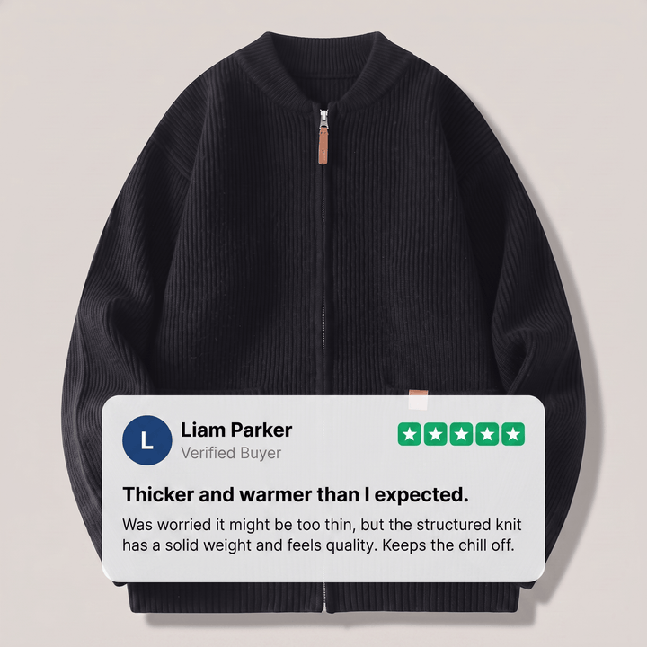 Black rib knit jacket with full zip front and patch pockets, ribbed collar