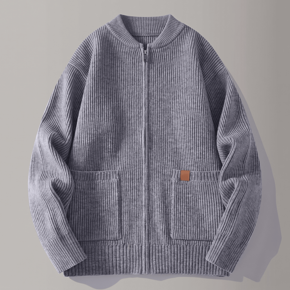 Grey rib knit jacket with full zip, ribbed collar, and two patch pockets