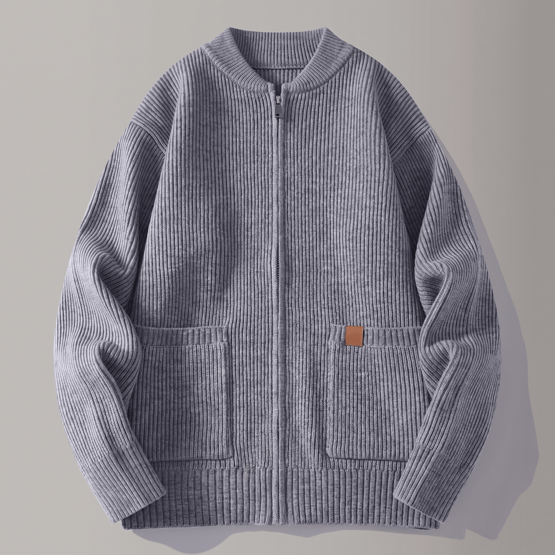 Grey rib knit jacket with full zip, ribbed collar, and two patch pockets