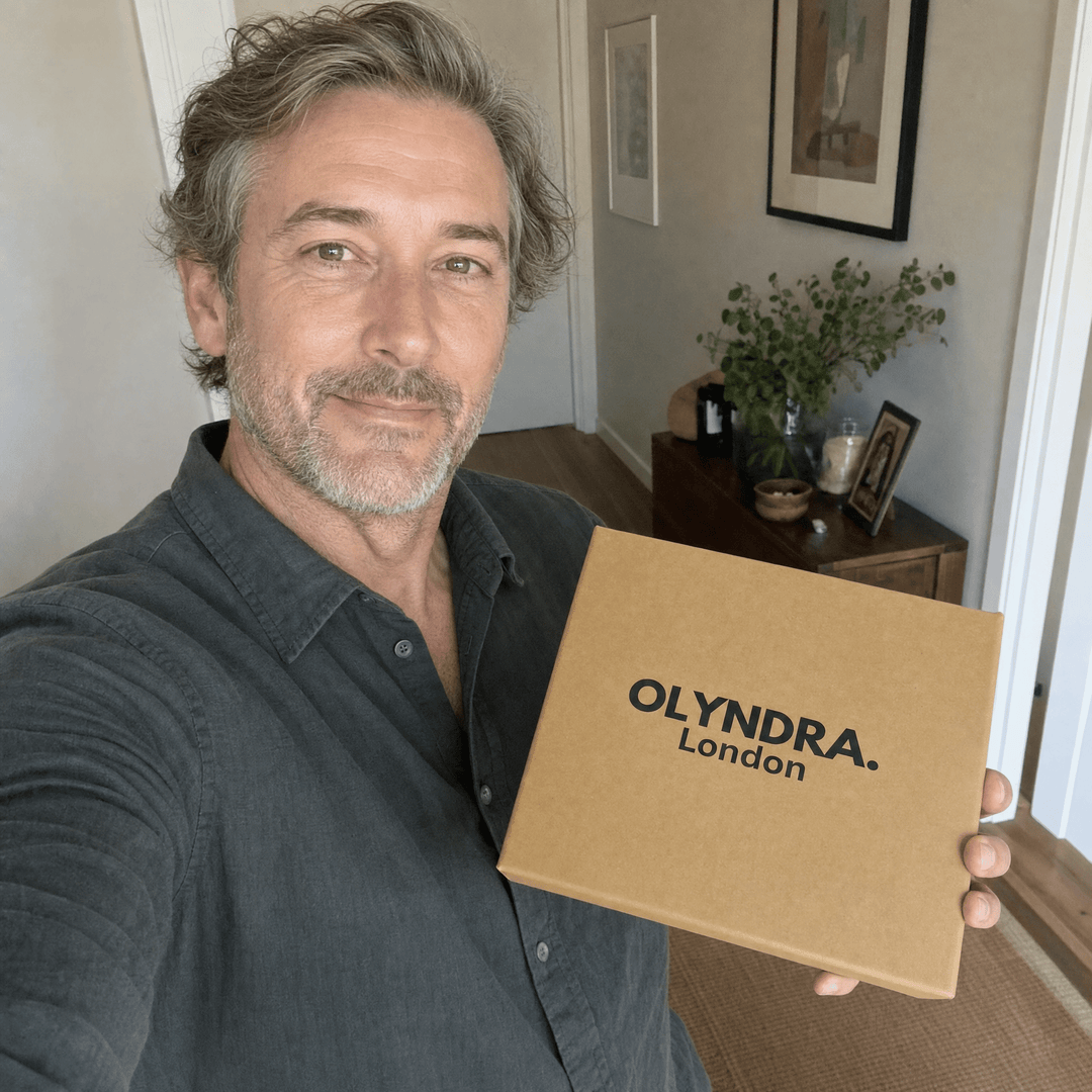 OLYNDRA mystery box in brown cardboard with London logo