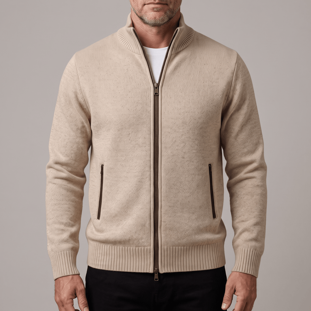 Beige zip-up cardigan with metal zipper, stand collar, and two side pockets.