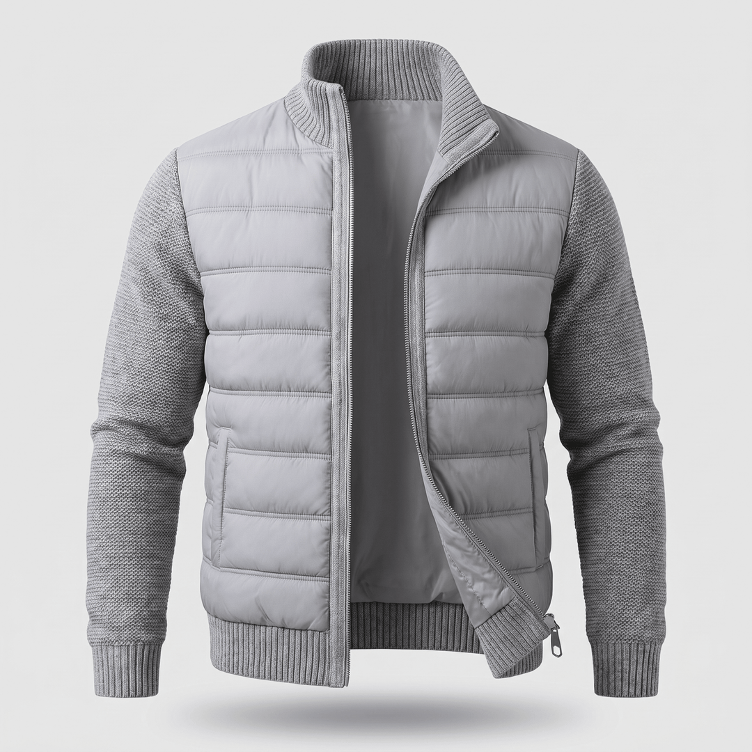 Light grey quilted jacket with knit sleeves, ribbed collar and cuffs, zip front