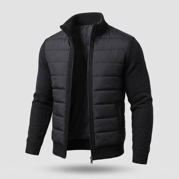 Black quilted jacket with knit sleeves, ribbed collar and cuffs, full zip front