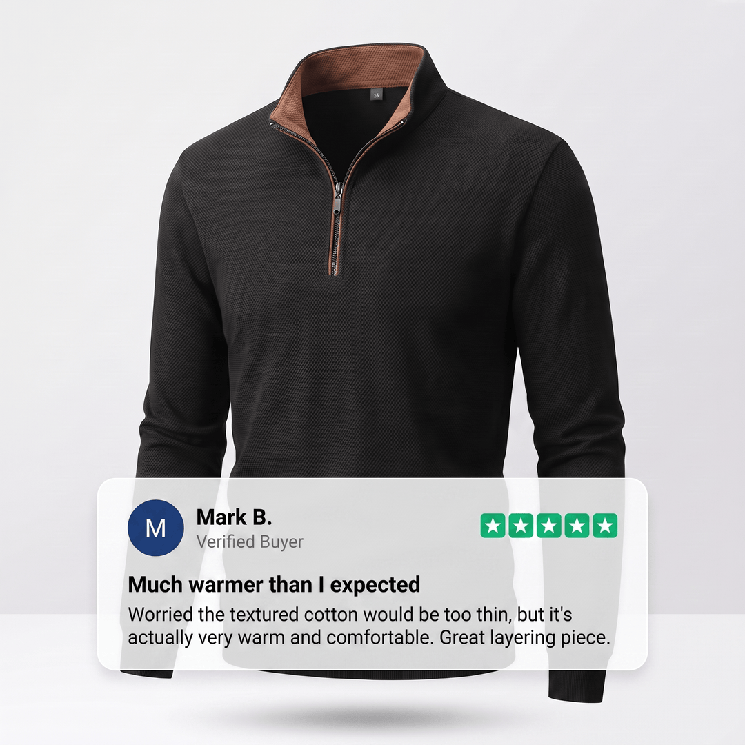 TAVREN quarter-zip pullover in black with ribbed cuffs and quarter zip collar